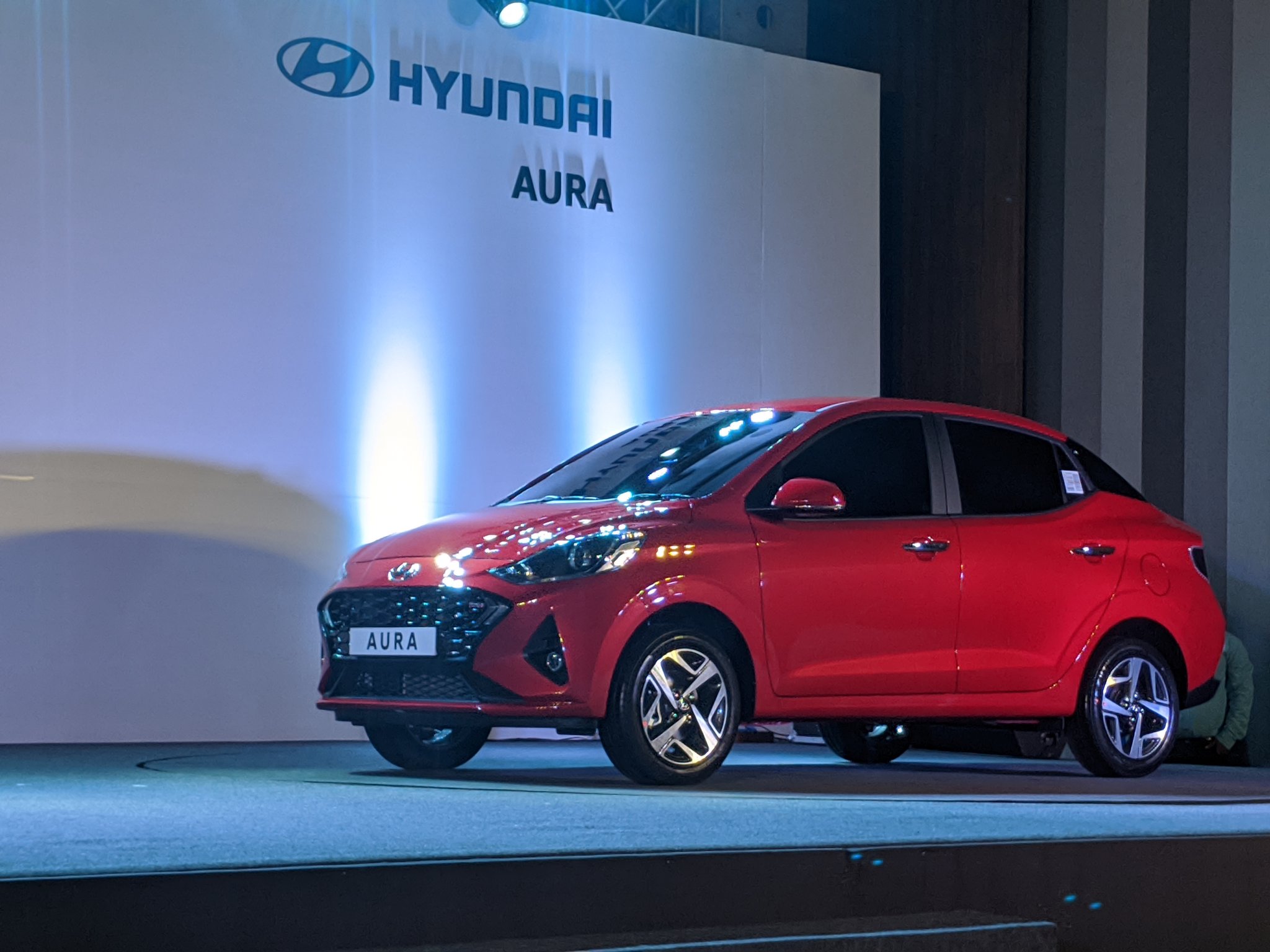 Hyundai unveils Aura sedan, takes the fight to Dzire, Tigor and Amaze   Hyundai unveils Aura sedan, takes the fight to Dzire, Tigor and Amaze Â
