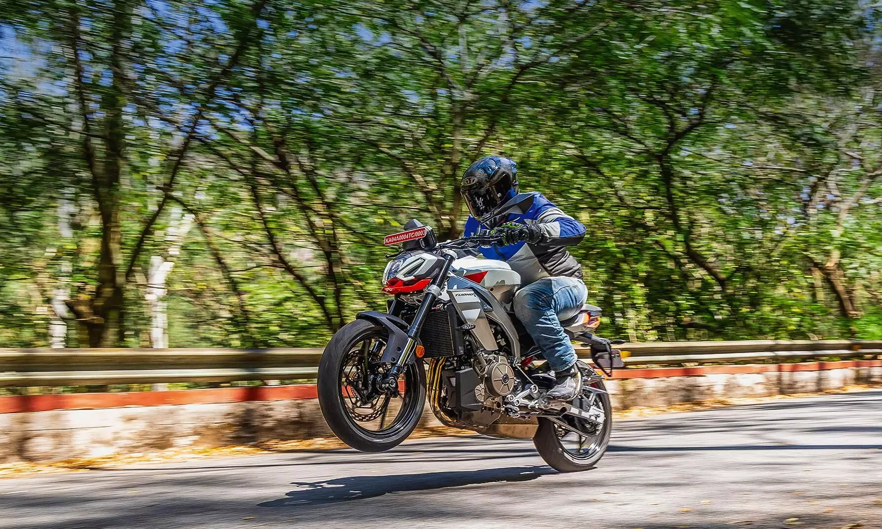The Tuono 457 is more than happy to power wheelie in first and second without having to touch the clutch at all. -Shot by Rohit G Mane for Evo India The Tuono 457 is more than happy to power wheelie in first and second without having to touch the clutch at all. -Shot by Rohit G Mane for Evo India