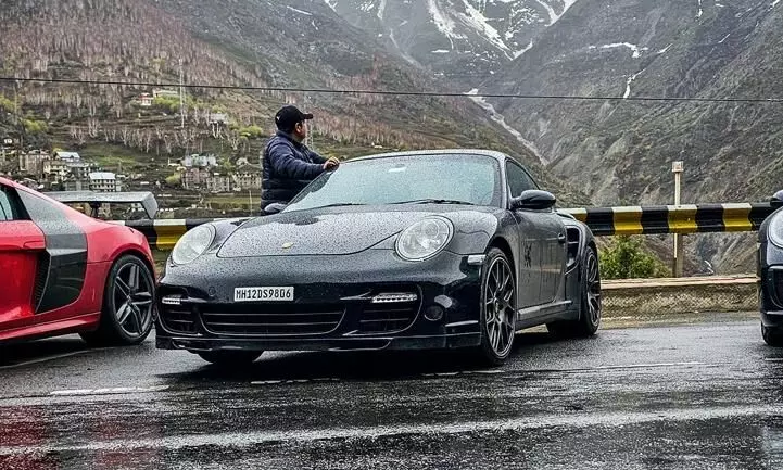 Wet mountain roads, misty, snow-clad mountain tops and a Porsche 911 Turbo with its AWD system were a match made in motoring heaven Wet mountain roads, misty, snow-clad mountain tops and a Porsche 911 Turbo with its AWD system were a match made in motoring heaven