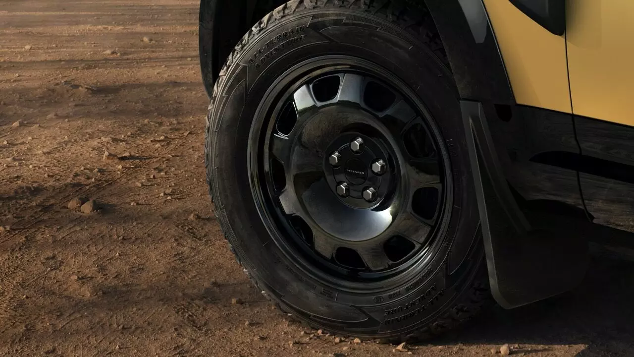 The Defender 110 Trophy Edition is equipped with gloss black 20-inch alloy wheels wrapped in all-terrain tyres The Defender 110 Trophy Edition is equipped with gloss black 20-inch alloy wheels wrapped in all-terrain tyres