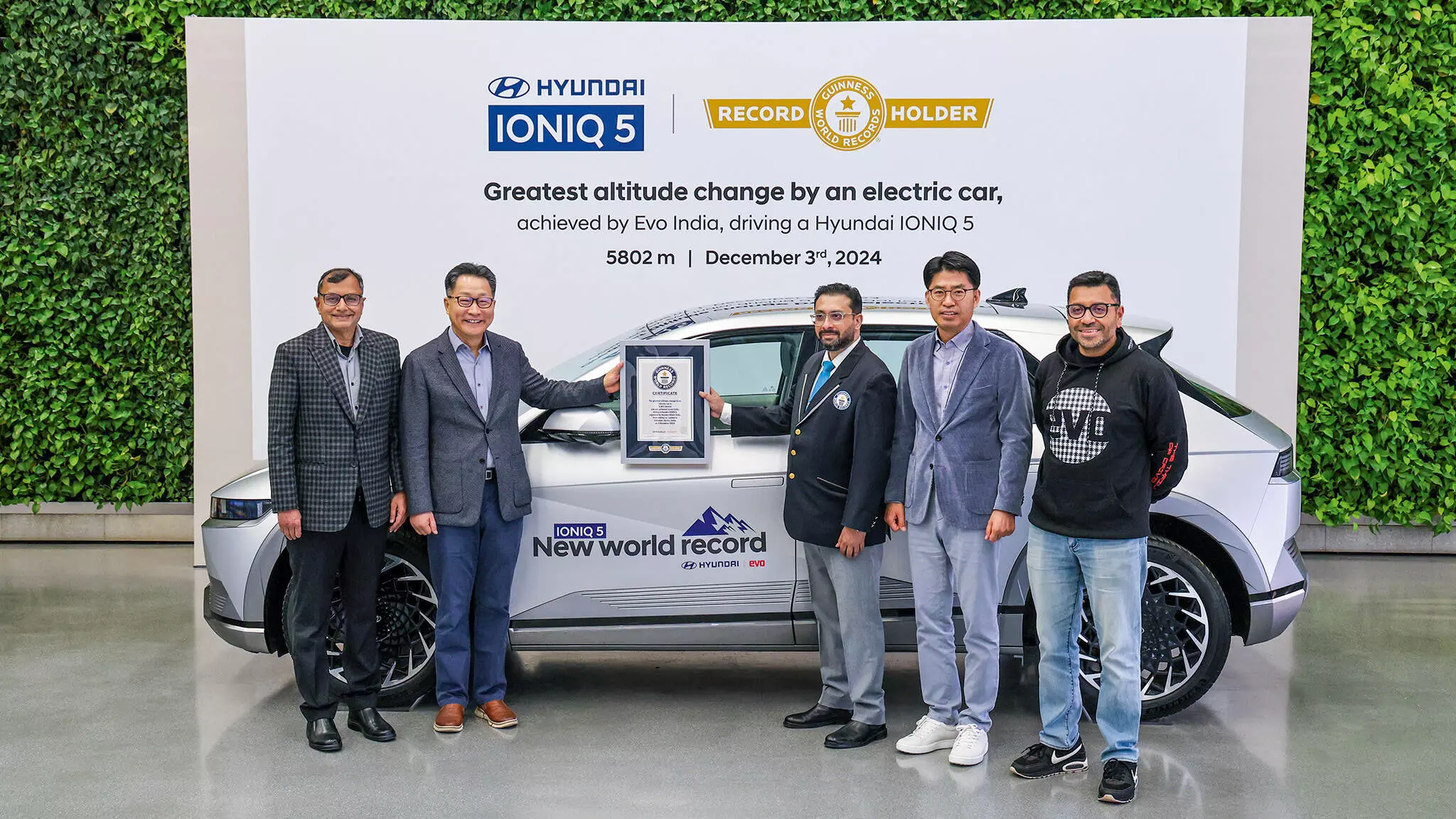 Rishi Nath, Adjudicator, Guinness World RecordsTM handing the official record certificate for the greatest elevation change by an electric car at 5,802metres, achieved by evo India, driving a Hyundai Ioniq 5 on December 3, 2024 to Unsoo Kim, managing director, HMIL. (Remaining from left to right) TarunGarg, whole-time director and chief operating officer, HMIL, J.T.Park, executive director, sales, marketing & service, HMIL and Ed Sirish Chandran. Rishi Nath, Adjudicator, Guinness World RecordsTM handing the official record certificate for the greatest elevation change by an electric car at 5,802metres, achieved by evo India, driving a Hyundai Ioniq 5 on December 3, 2024 to Unsoo Kim, managing director, HMIL. (Remaining from left to right) TarunGarg, whole-time director and chief operating officer, HMIL, J.T.Park, executive director, sales, marketing & service, HMIL and Ed Sirish Chandran.