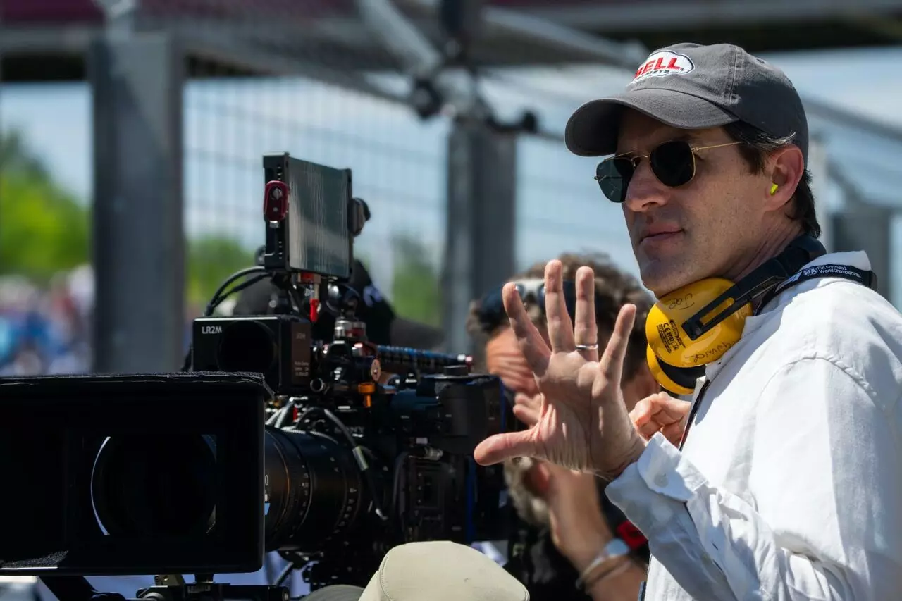 Director and producer Joseph Kosinski on the sets of the F1 movie, which was shot during actual Formula 1 Grand Prix weekends Director and producer Joseph Kosinski on the sets of the F1 movie, which was shot during actual Formula 1 Grand Prix weekends