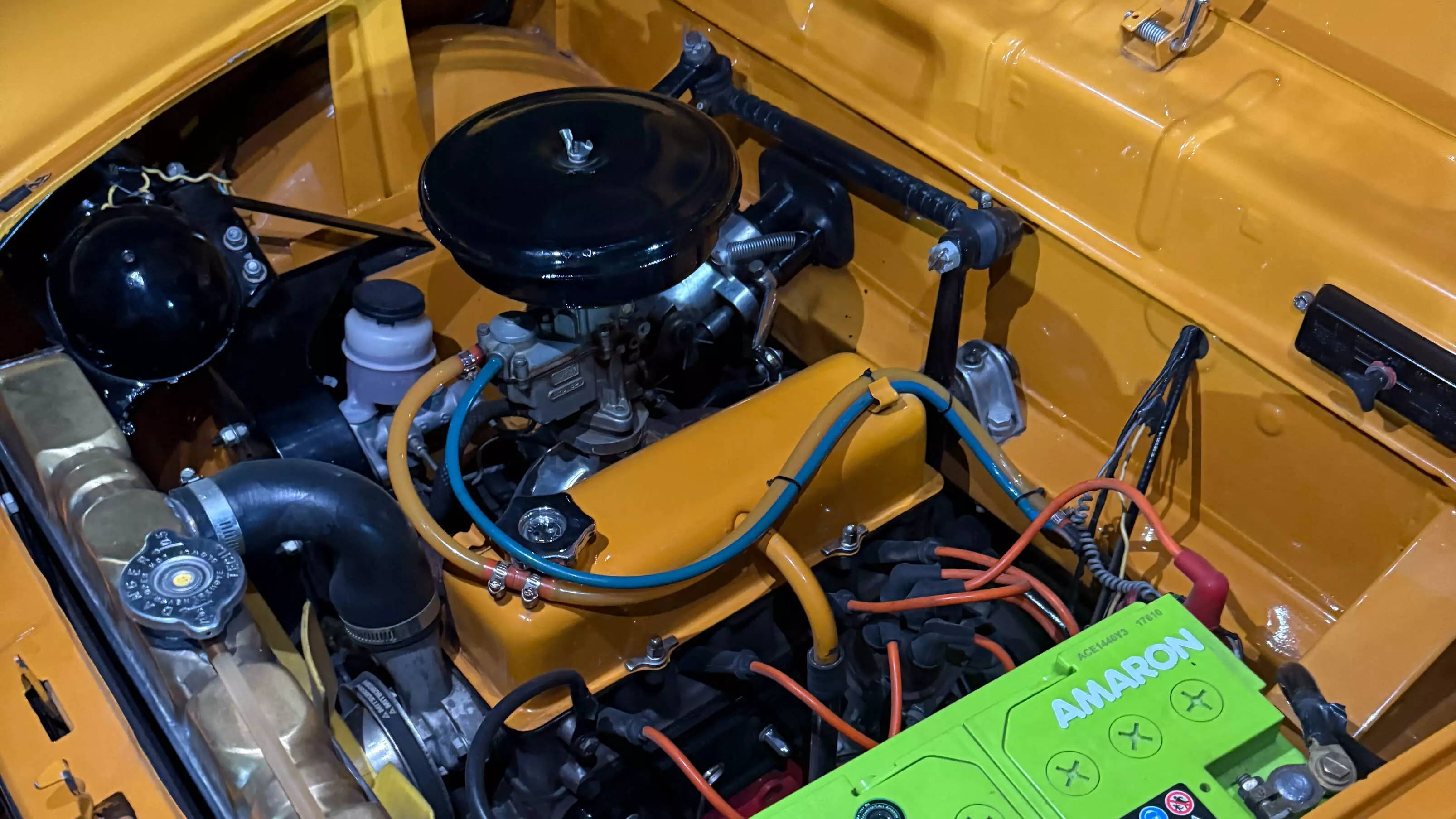 This 1987 Premier Padmini by RASN Design features a  custom cosmic yellow paint, custom suspension and ride height and is equipped with disc brakes (from the Fiat Palio and the Fiat Uno).