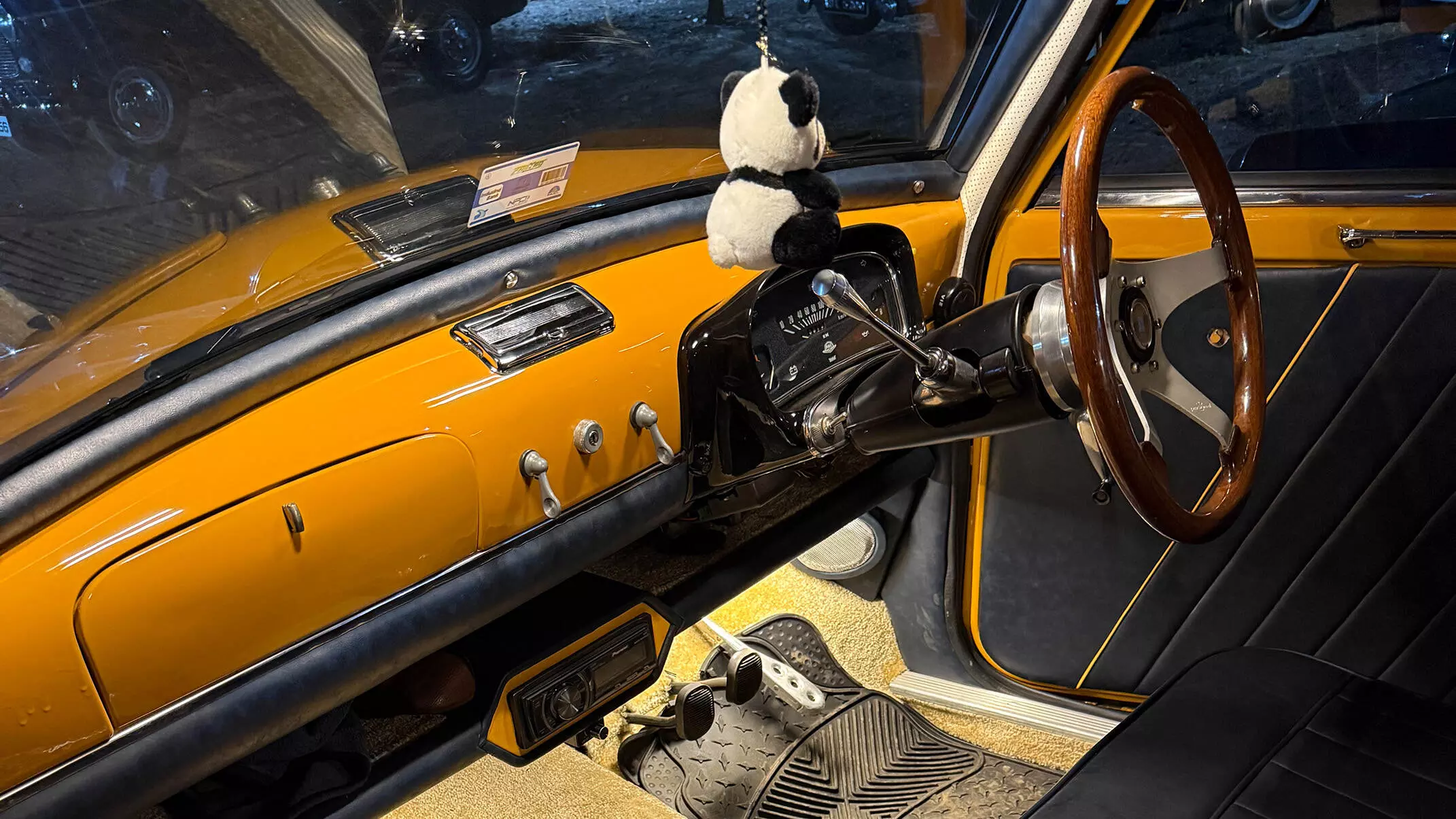 The interior stays true to the original layout with the exception of a bespoke handcrafted wood rimmed steering wheel with a power steering system.