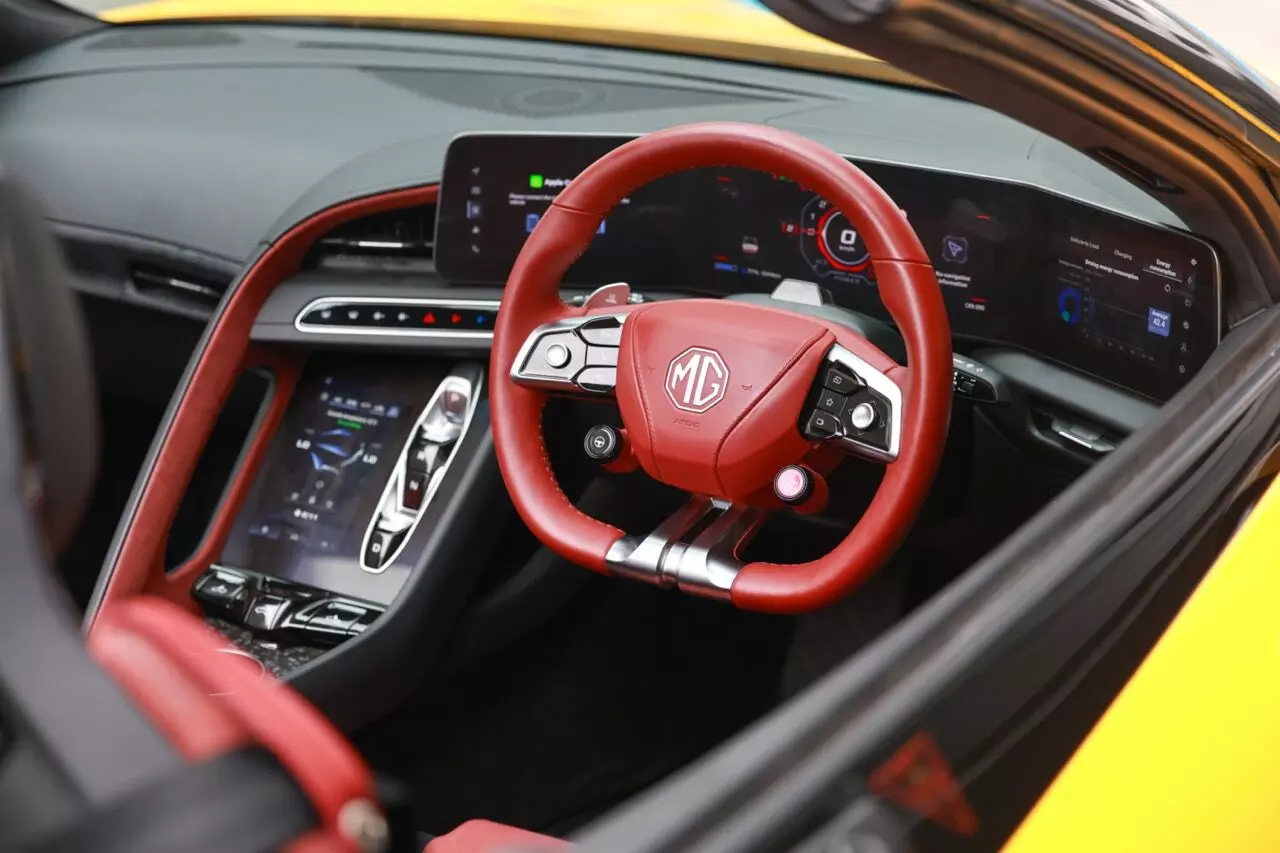 You get three small screens arranged in a wrap-around fashion around the driver in the MG Cyberster – shot by Rohit G Mane for evo India You get three small screens arranged in a wrap-around fashion around the driver in the MG Cyberster – shot by Rohit G Mane for evo India
