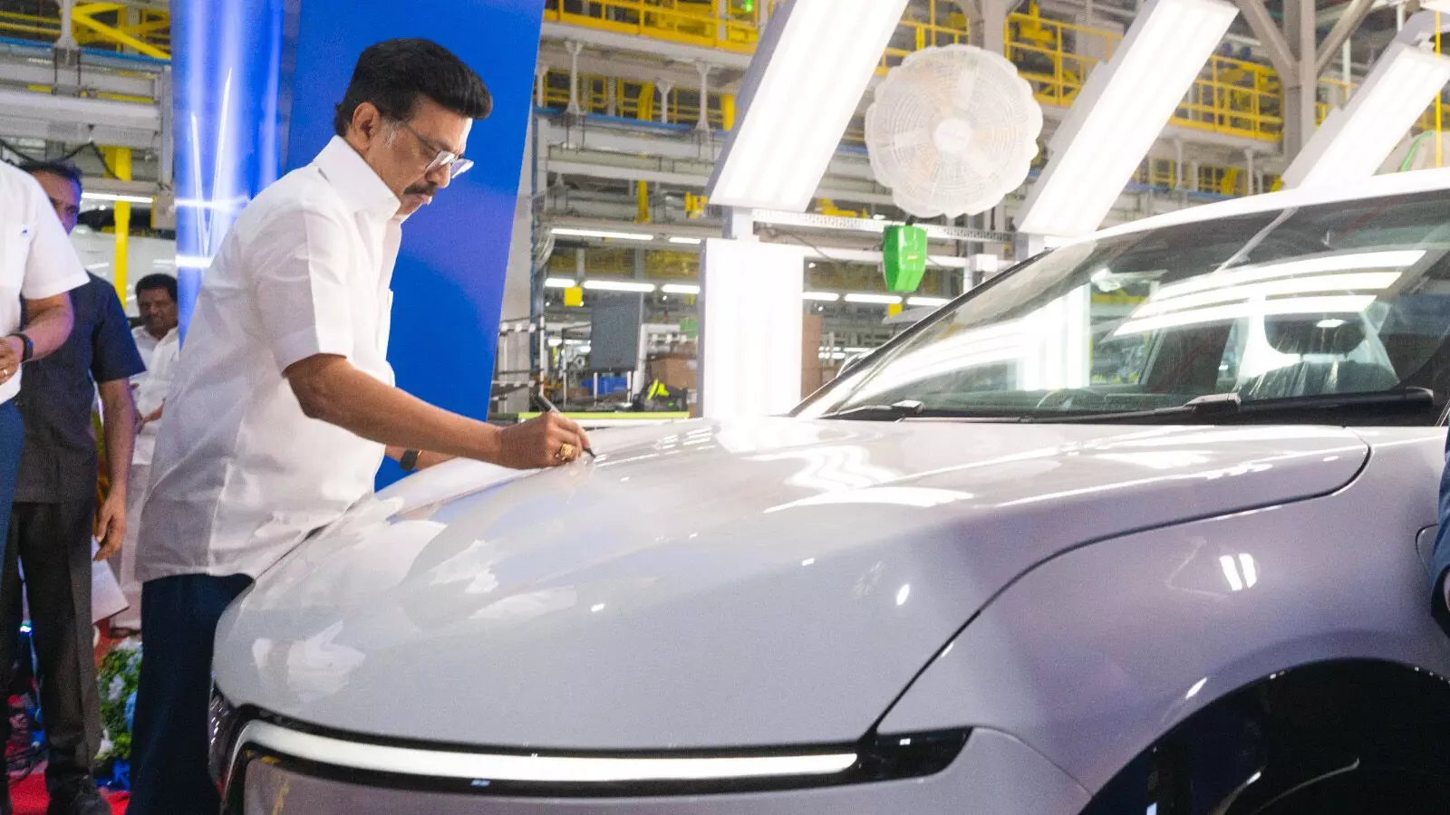 The Hon’ble Chief Minister of Tamil Nadu signing the first VinFast VF 7 premium EV to roll off of the assembly line at the opening of the Thoothukudi plant — Shot by VinFast India