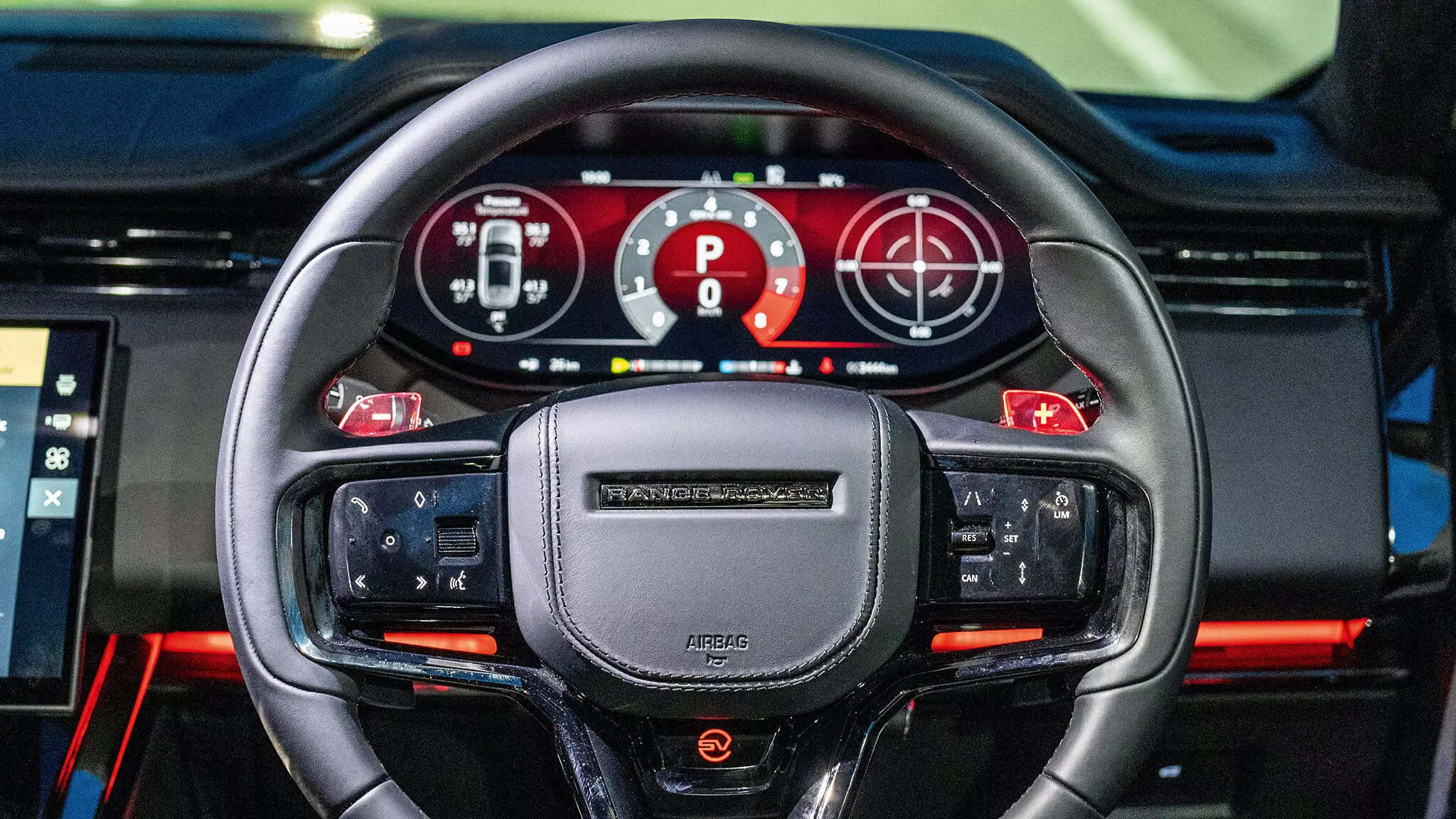 The Range Rover Sport SV Edition Twos red glowing paddle shifters and the SV Mode button help set the tone for the high-octane driving — Shot by Avdhoot A Kolhe for evo India