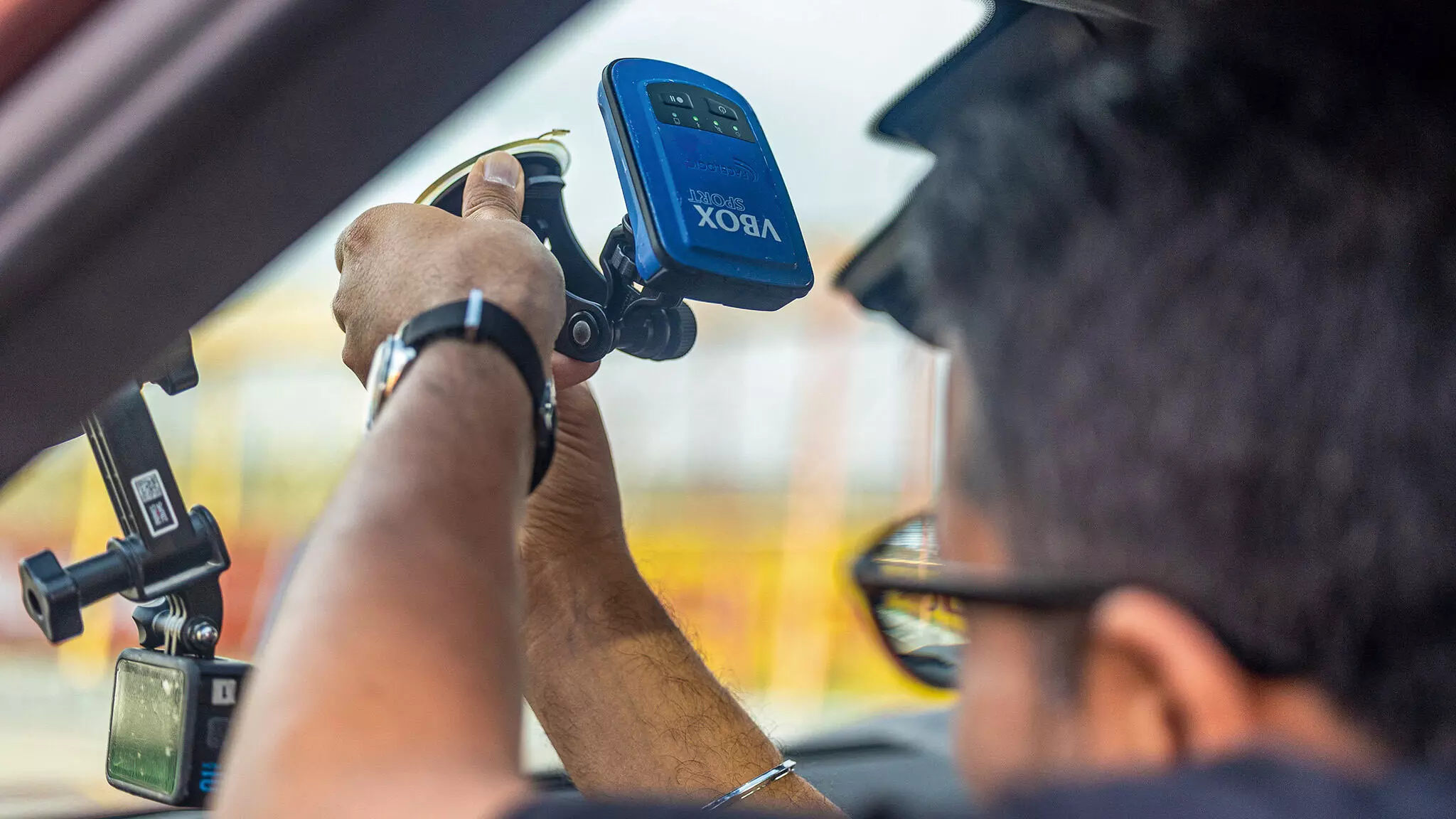 Ed, Sirish Chandran setting up the VBOX in the Range Rover Sport SV Edition Two, to record detailed sector times — Shot by Avdhoot A Kolhe for evo India