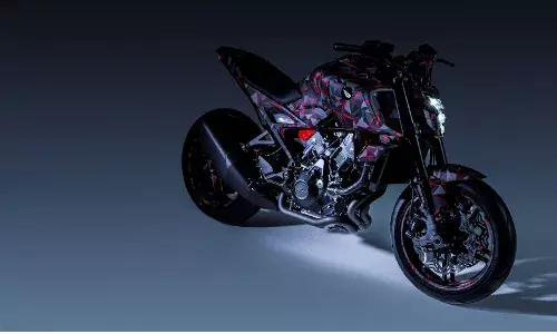 Honda unveils the V3R 900 E-Compressor concept at the EICMA 2025 show in Milan