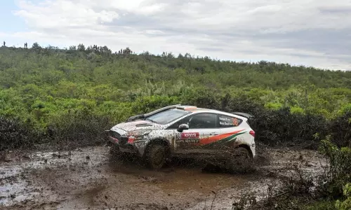 Naveen Puligilla and Musa Sherif on podium at 2026 Safari Rally Kenya