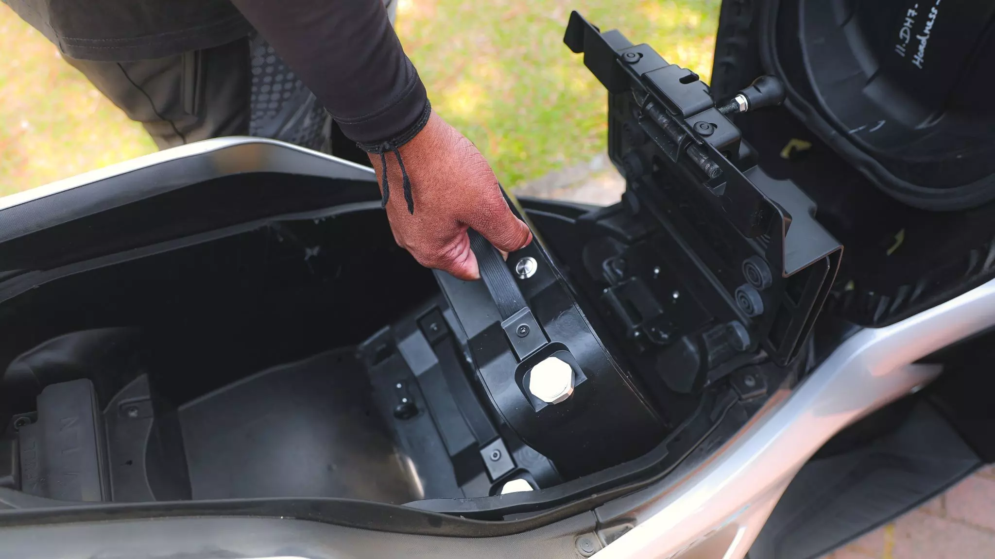 The underseat storage take a hit in lieu of the two removable 1.5kWh batteries – Shot by Rohit G Mane for evo India